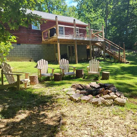 Gas Fireplace, Firepit, And Cedar Adirondack Chair